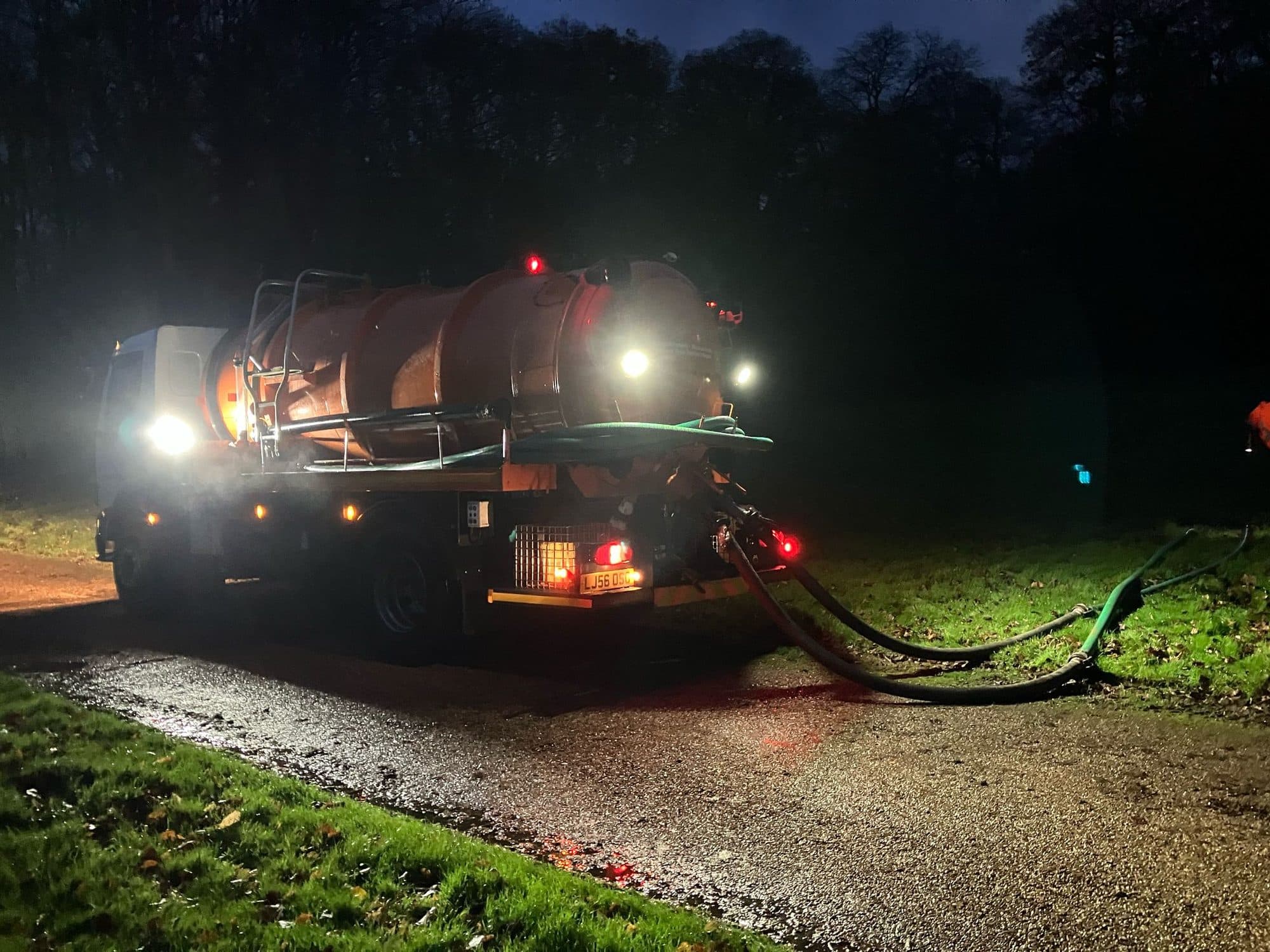 KP tanker working after dark with its lights on during a night emergency callout