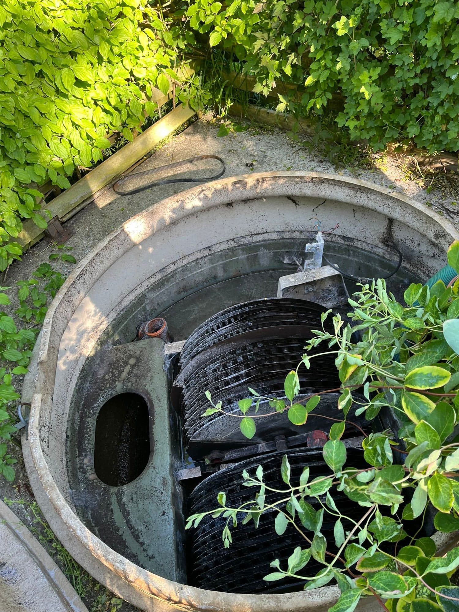 Sewage treatment plant chamber opened up showing the biodisc and internal baffles